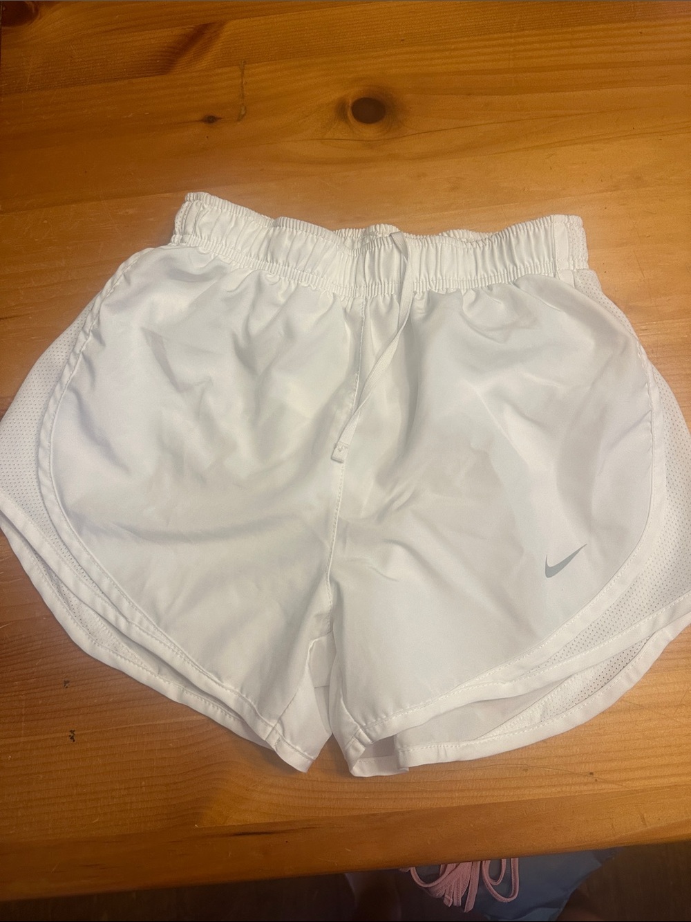 Nike Women's White Athletic Running Shorts with Subtle Swoosh